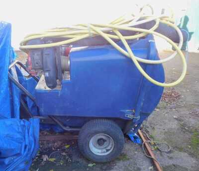 An industrial petrol garden vacuum, with tow bar attachment and piping, 125cm wide.