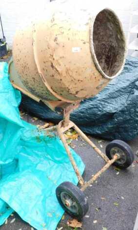 An electric cement mixer.WARNING! This lot contains untested or unsafe electrical items. It is supplied for scrap or re-conditioning only. TRADE ONLY