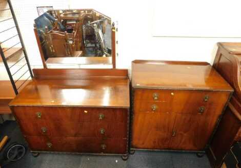 A 1930s walnut part bedroom suite, comprising a mirror back chest, together with a compactum, with two drawers above two cupboard doors, 95cm high.