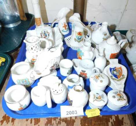 A group of crested china, comprising vases, fire bellows, etc., for Wakefield, Rhyl, Brighton and others. (1 tray)