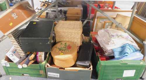 A Blaupunkt amplified television aerial, two wicker baskets, cased fish servers, various table linen, collectors magazines, jewellery boxes, etc. (all under one table)