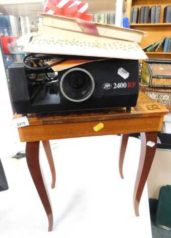 A music table, a slide projector, jet style brooches, boxes, etc. (a quantity)