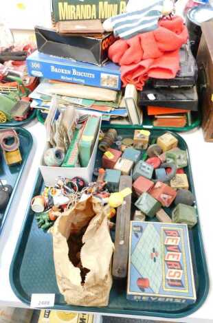 Toy blocks, marbles, keyrings, miniature globe, part pencil set, playing cards, books, Burago model car, etc. (2 trays)