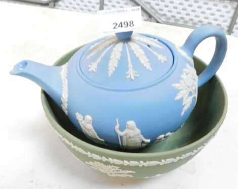 A Wedgwood green jasperware bowl, and a Wedgwood blue jasperware teapot. (2)