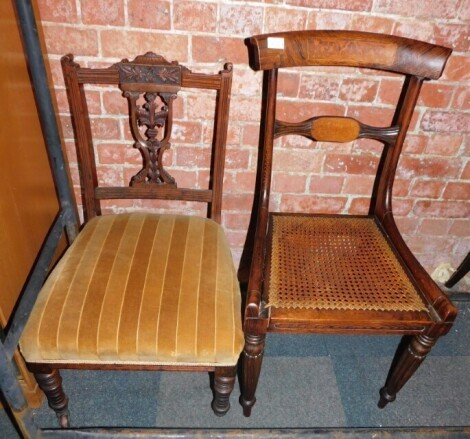 An Edwardian walnut dining chair with pierced splat, together with a simulated rosewood and marquetry inlaid dining chair with caned seat. (2)