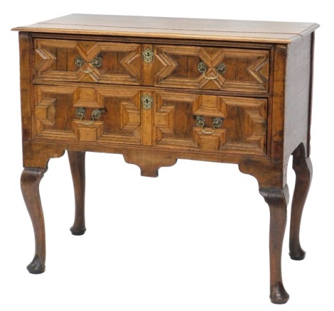 A 19thC oak chest, of two drawers on cabriole legs in the Jacobean style, 92cm high, 104cm wide, 53cm deep.