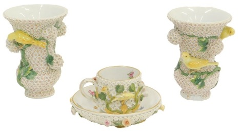 A rare pair of Meissen porcelain Schneeballen canary vases, of thistle shape, 14cm high, a similar Meissen porcelain cup and saucer or reversible domed stand. (AF)