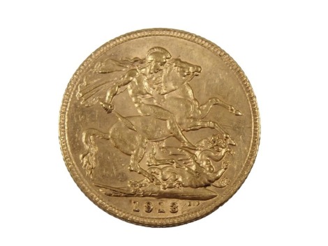 A George V full gold sovereign dated 1913.