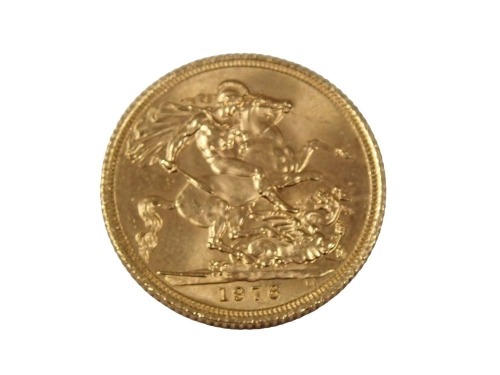 An Elizabeth II full gold sovereign dated 1976.