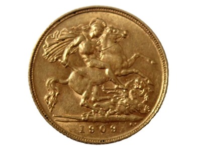 An Edward VII half gold sovereign dated 1909.