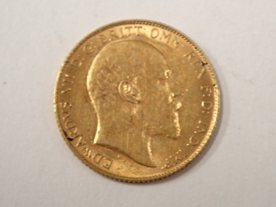 An Edward VII half gold sovereign dated 1909. - 2