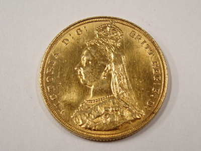 A Victorian full gold sovereign dated 1887. - 2