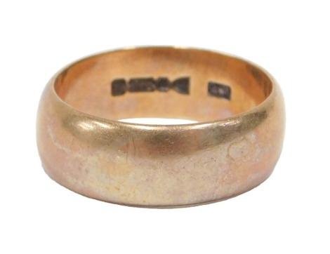 A 9ct rose gold wedding band, of plain design, ring size U, 6mm wide, 6.6g all in.