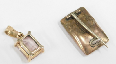 Two items of jewellery, comprising a memorial brooch, rectangular with cane flower centre, 2cm x 1cm, and a 9ct gold cased pink topaz pendant, 6.2g all in. (2) - 2