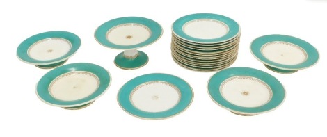 A 19thC porcelain part dessert service, of plain form with green band, to include five comports or stands.