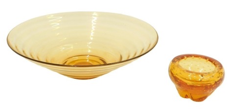 A Whitefriars style amber tinted flared ribbed bowl, 26cm wide, and a bubble included amber tinted bowl, 12cm wide.