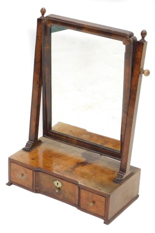 A George III dressing table mirror, with shaped rectangular plate, inverted breakfront with three drawers, 42cm wide.