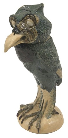 A replica Martinware 'wally bird' decanter, bearing signature to rim on a circular foot, 31cm high.