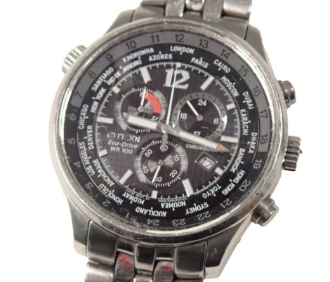 A Citizen Eco Drive WR100 gent's fashion watch, in stainless steel case, boxed.