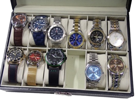 Eleven gentleman's fashion watches, replica brands Wwoor and others, in black leatherette case.