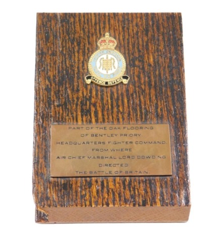 A Royal Airforce Fighter Command flooring block section, applied with enamel crest, with plaque relating to the Air Field Marshall Dowding & Bentley Priory, 12cm x 8cm.