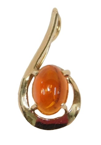 A 20thC fire opal scroll design pendant, set with single cabochon cut opal, 9mm x 6.5mm x 4.72mm, approx 1.49ct, claw set, on a scroll yellow metal frame, believed to be 14ct, 2.20g all in, 2cm high.