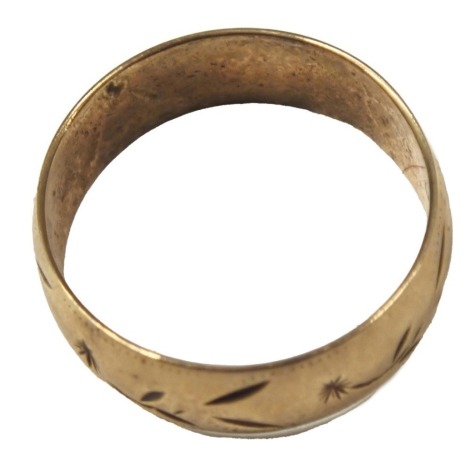 A 9ct gold wedding band, of hammered floral and beaded design, ring size O½, 2.7g all in.