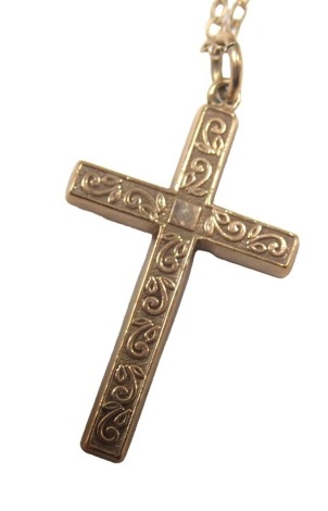 A 9ct gold crucifix pendant and chain, the embossed crucifix 3cm high, on a fine link neck chain, 44cm long, 4.6g.