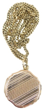 A 9ct gold curb link neck chain, 53cm long, with 9ct rose gold locket, 8g all in.