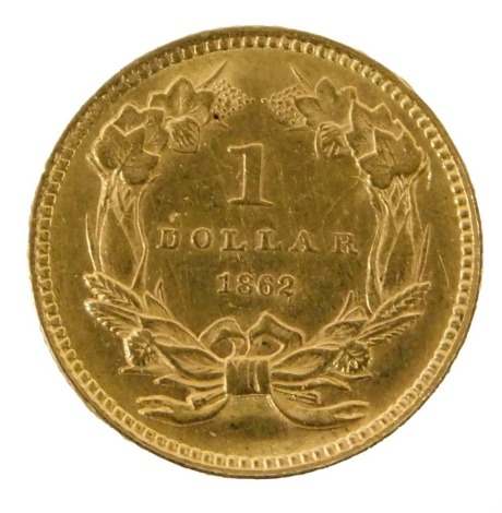 A United States Indian Princess gold 1862 one dollar coin, inverted and other anomalies.