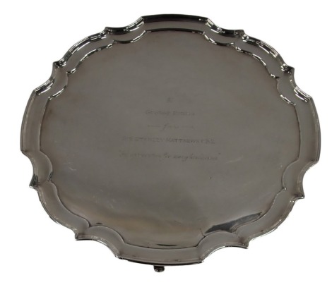 A silver plated salver, awarded to George Birks from Sir Stanley Matthews CBE in appreciation for many years kindness, with a city of Stoke 70th birthday ball programme, bearing signatures, 30cm diameter.