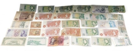 A quantity of banknotes, comprising four ten shilling notes, various one pound notes, United States of America dollars, etc. (a quantity)