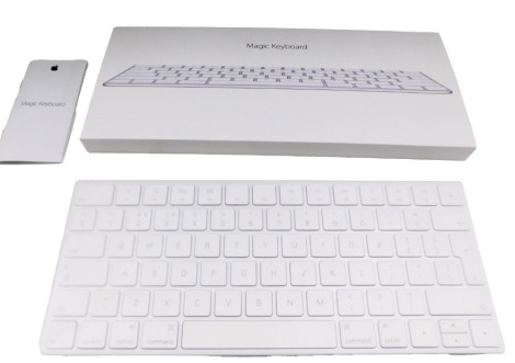 An Apple Magic keyboard, model A1644, boxed.