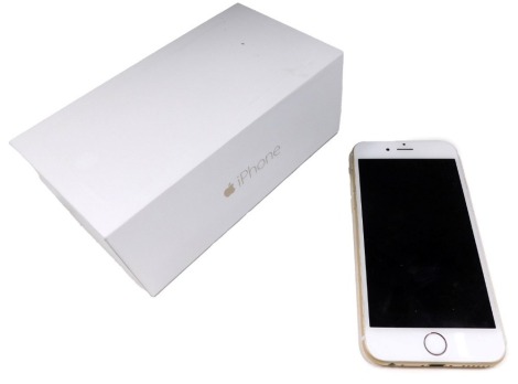 An Apple iPhone 6, rose gold, model A1586, boxed.