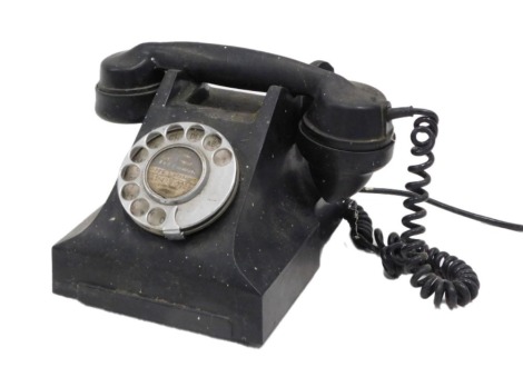 A black Bakelite GPO telephone with receiver, model number 332L. (AF)