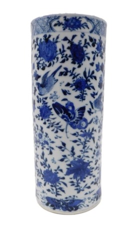 A Chinese blue and white cylindrical vase, decorated with flowers, leaves, birds and insects, four character mark to underside, 26cm high. (AF)