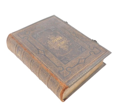 A Victorian Reverend John Brown self-interpreting family bible, in leather binding with metal mounts.