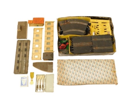 A quantity of OO gauge railway accessories, buildings, Scalextric track etc.