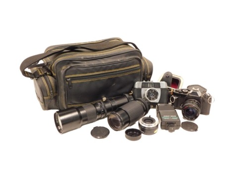 A quantity of camera equipment, to include a Miranda camera with lens, a Mackinnon zoom lens, an Insinor 400mm lens, etc.