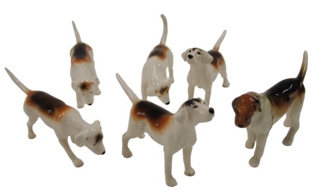 A collection of five Beswick hunting hounds, and another similar.