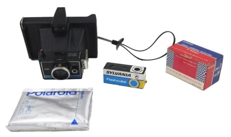 Camera and optics equipment, comprising a Polaroid Colour Pack 2, a Sun Pack DC3, a Corvette box camera, and an Ilford Sports Master camera.