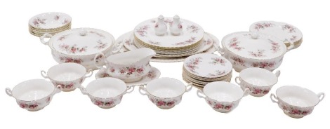 A Royal Albert Lavender Rose pattern part dinner service, comprising two tureens and covers, two graduated meat plates, gravy boat and saucer, seven soup bowls, salt and pepper pots, six bowls, seven saucers, six side plates, and six dinner plates.