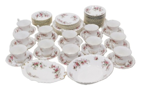 A Royal Albert Lavender Rose pattern part tea service, comprising twelve teacups, thirty two saucers, serving bowl, six medium plates and eight side plates. (1 tray)