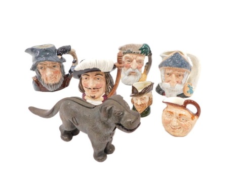 Royal Doulton and other character jugs, comprising Don Quixote, Rip Van Winkle, Porthos, Robinson Crusoe, and two miniatures, together with a brass dog nut cracker. (1 tray)