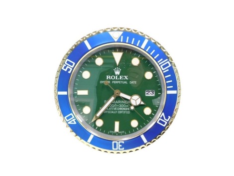 A replica Rolex Oyster Perpetual advertising clock, with green dial, 35cm diameter.