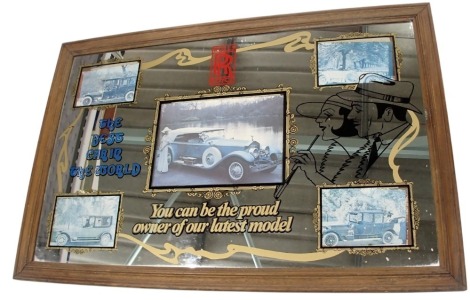 An advertising mirror for Rolls Royce Motor Cars, inset with various coloured prints, 55cm x 83cm.