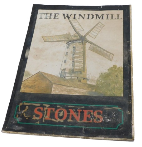 A painted tin pub sign, for The Stones Public House The Windmill, decorated with a windmill, within black borders, 117cm high, 88cm wide. (AF)