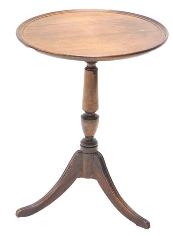 A mahogany wine table, with circular disk top and tripod base, 35cm diameter.