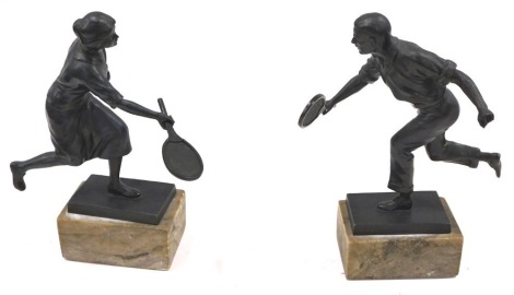 Early 20thC School. Male and female tennis players, bronzed spelter on an marble base, a pair 25cm and 24.5cm high respectively.