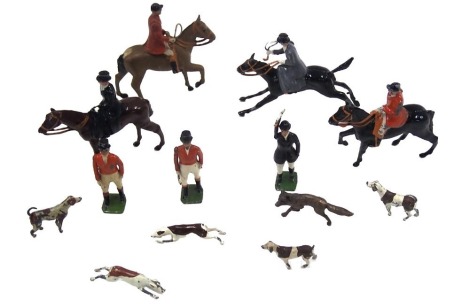 A small group of play worn diecast Britain's figures, hunting on horseback and dogs.